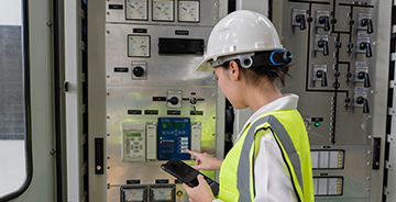 DDC controls technician working on equipment